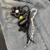 Charms black flower
