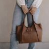 Drilled Logo Shoulder bag La Carrie (vari colori) Drilled Logo Shoulder bag La Carrie (vari colori)
