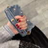 Tracollina denim borchiette