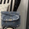 Tracollina denim borchiette