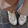 Sneaker running gold Ovye