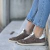 Sneaker taupe borchiette