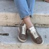 Sneaker taupe borchiette