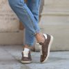 Sneaker taupe borchiette
