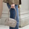 Woven shoulder bag gold La Carrie